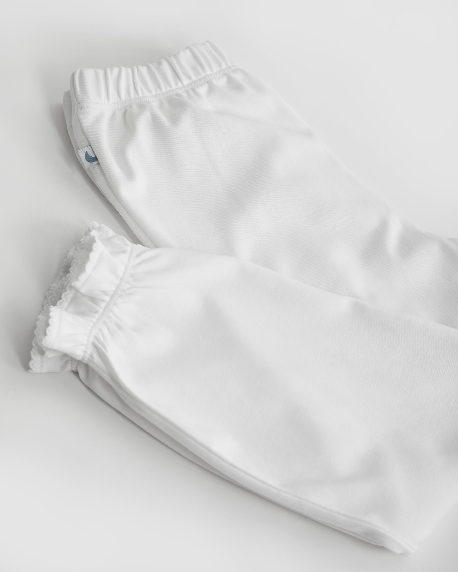 Pyjama enfant à volants et bande brodée