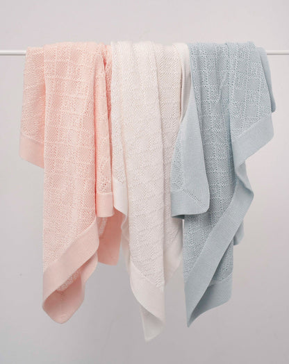 Couverture en coton perlé rose 